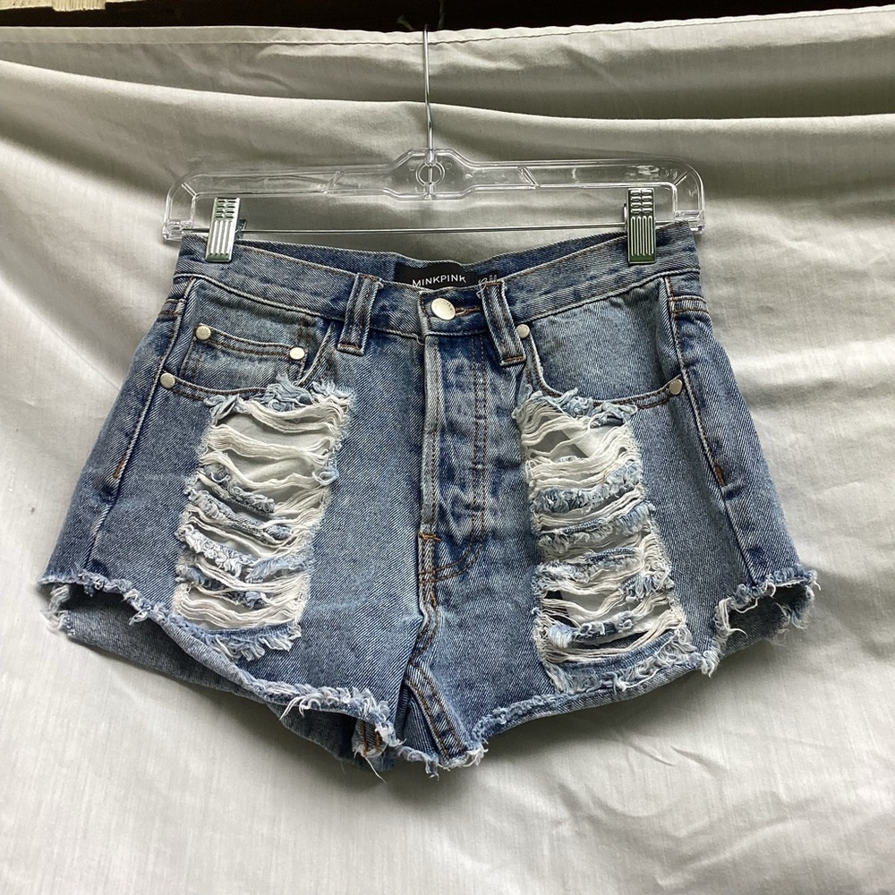 Mink Pink blue light wash distressed button fly shorts, size XS